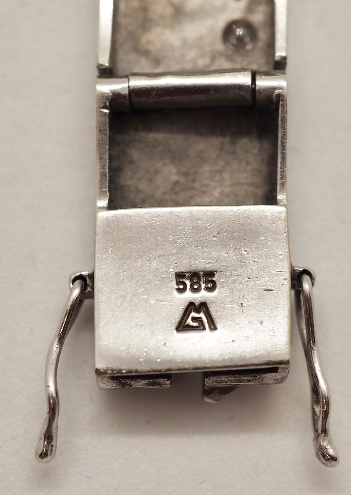 Armbånd i 14 K hvitt gull med 10 diamanter