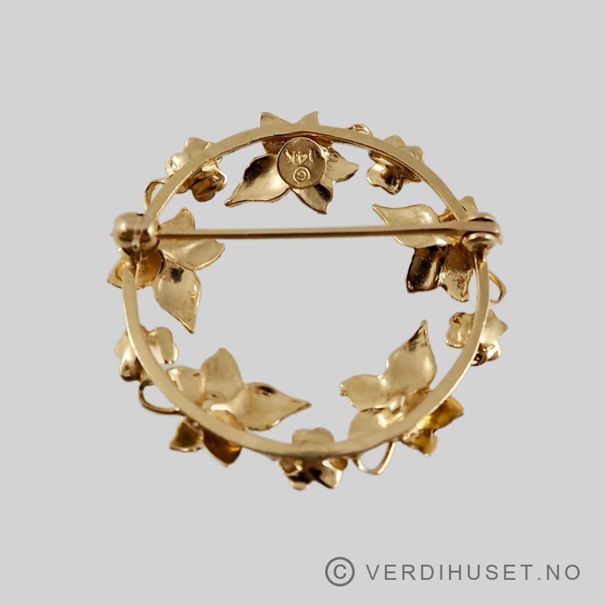 Brosje i 14 K gull med stener
