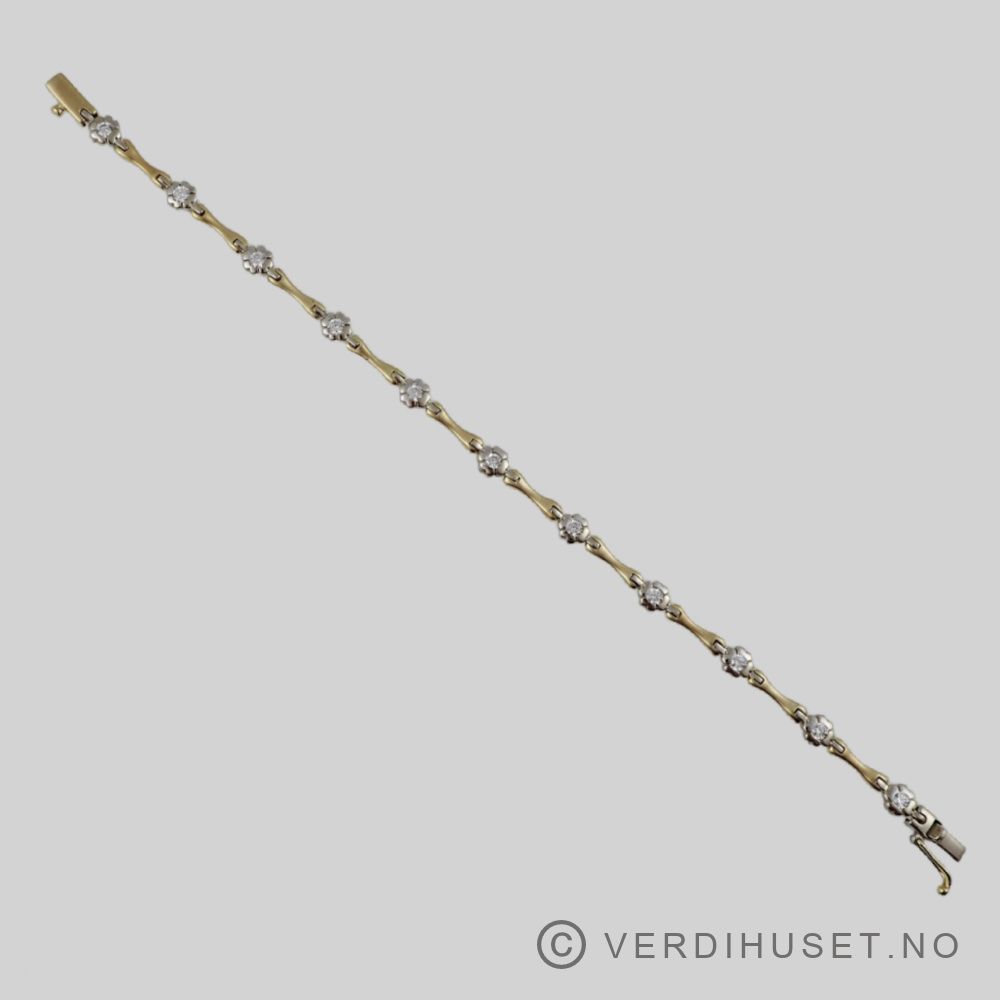 Armbånd i 14 K hvitt og gult gull med blanke stener